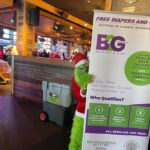 The Grinch having fun at B2G event with Seasons of Change.